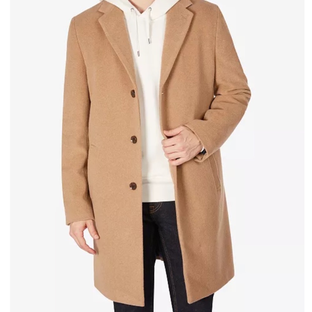 Tommy brand mens jacket. New with tag. Worn once. Will negotiate price.